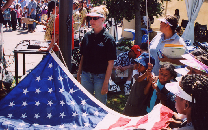 Mari helps riase the flag at the Del Mar Fair!