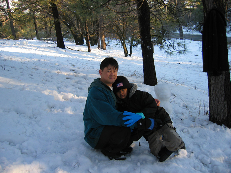 Mari gives daddy a hug!