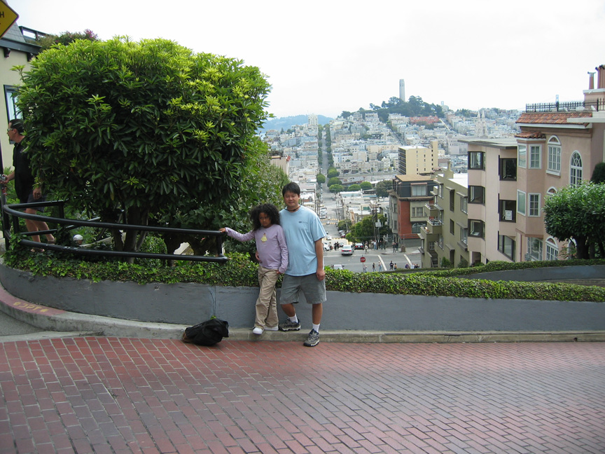 Mari and daddy walk down Lombard St.