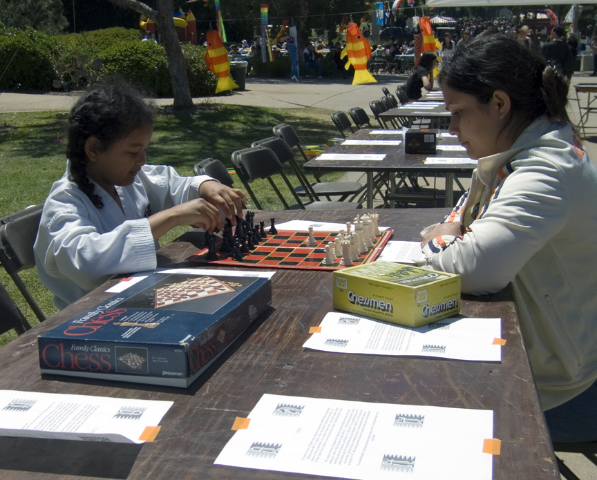 Mari plays chess at the Marshall College open house!